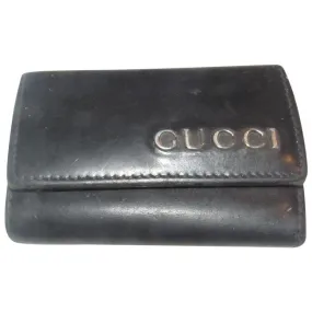 Gucci, black leather, snap close, tri-fold, key holder/card holder, mini- wallet w chrome accents & slots for your cards & six key holders